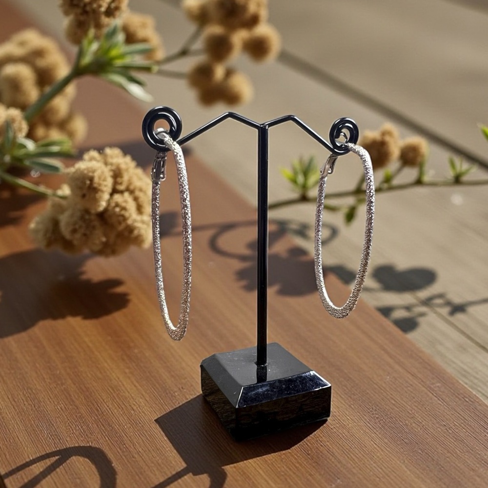Elegant Oval Silver Hoop Earrings with Glitter